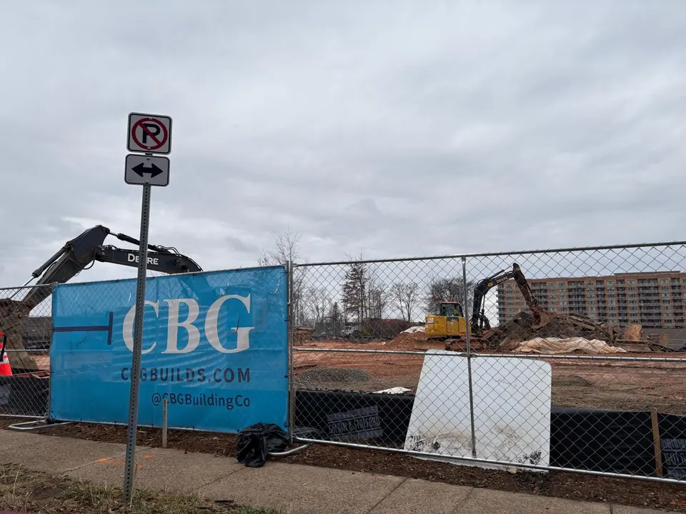 Construction is underway on the Elms Dunn Loring apartments on the former Dunn Loring Center site in Merrifield (staff photo by Angela Woolsey)