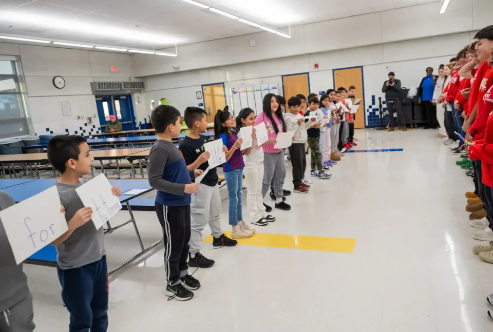 Braddock Elementary School students participate in a reading comprehension exercise.