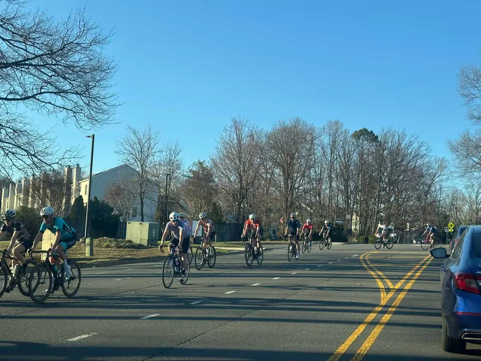 Bicyclists on Colts Neck Road in Reston (staff photo by Angela Woolsey)