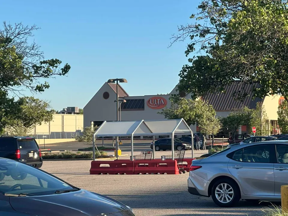 A shopping cart corral in the parking lot of Fair City Mall in Fairfax City (staff photo by Angela Woolsey)