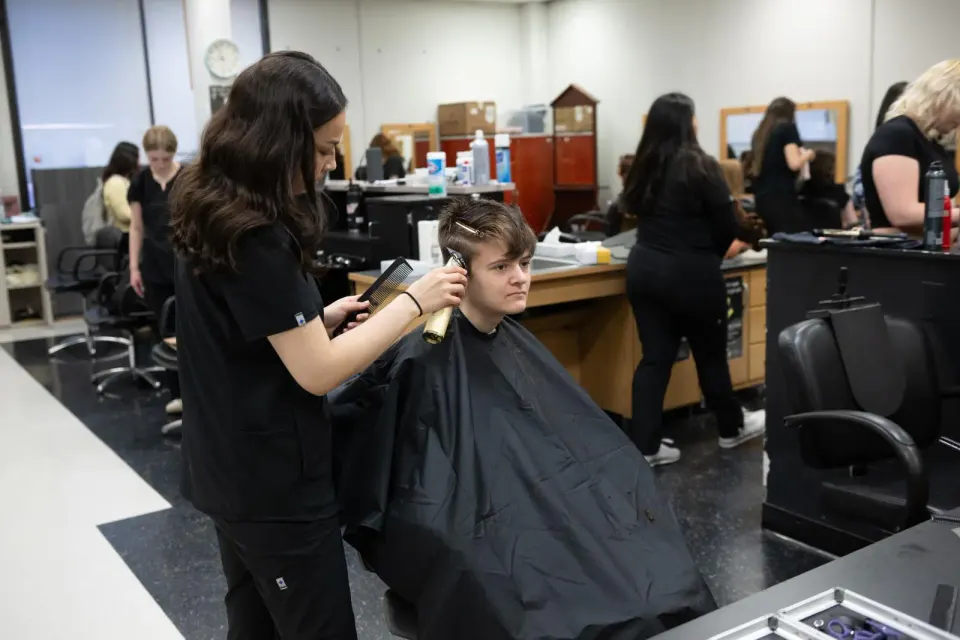 student does another student's hair