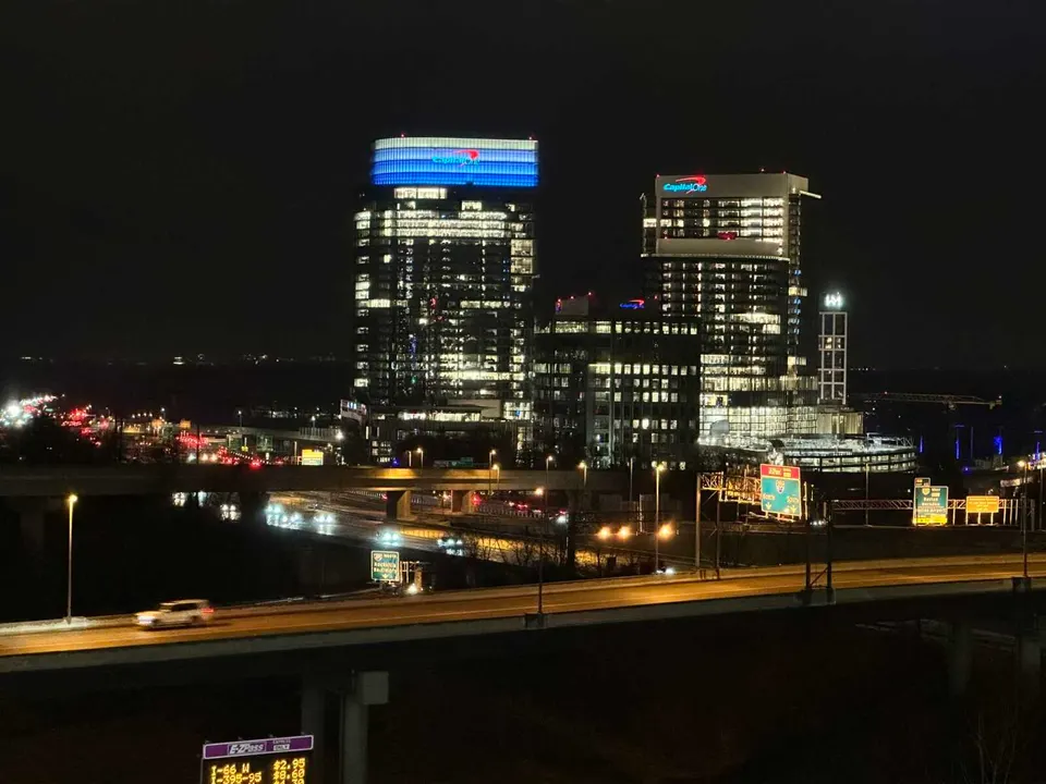 Capital One Center in Tysons at night (staff photo by Angela Woolsey)