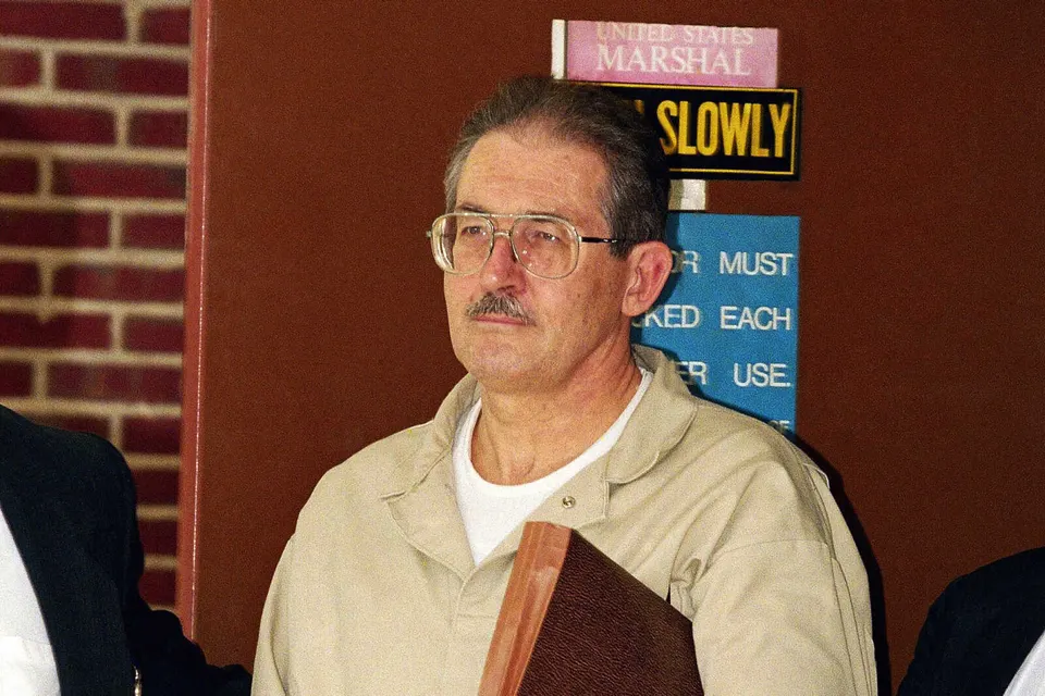 FILE – Former CIA agent Aldrich Ames leaves federal court after pleading guilty to espionage and tax evasion conspiracy charges April 28, 1994, in Alexandria, Va. (AP...