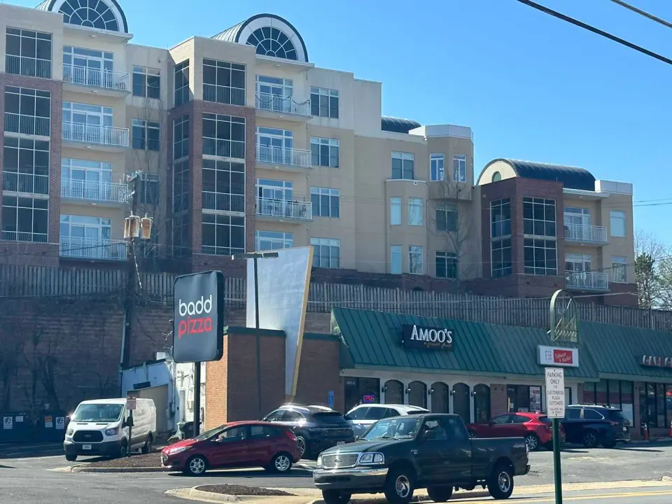 A pickup truck drives past Amoo’s on Old Dominion Drive in McLean (staff photo by Angela Woolsey)