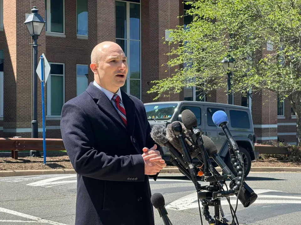 Fairfax County Commonwealth’s Attorney Steve Descano speaks outside the Fairfax County Courthouse following a Fairfax High School student’s sentencing for assault (staff photo...