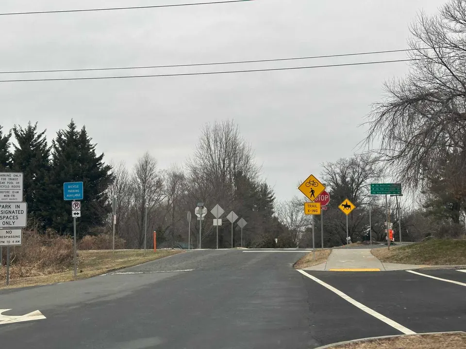 Power lines over the W&OD Trail at the Sunset Hills Road crossing in Reston (staff photo by Angela Woolsey)