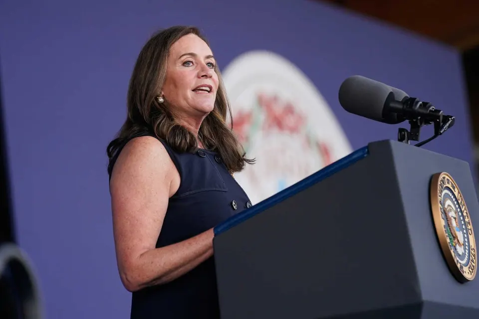 FILE – Dorothy McAuliffe speaks during a campaign event for her husband Virginia democratic gubernatorial candidate Terry McAuliffe at Lubber Run Park, July 23, 2021, in...