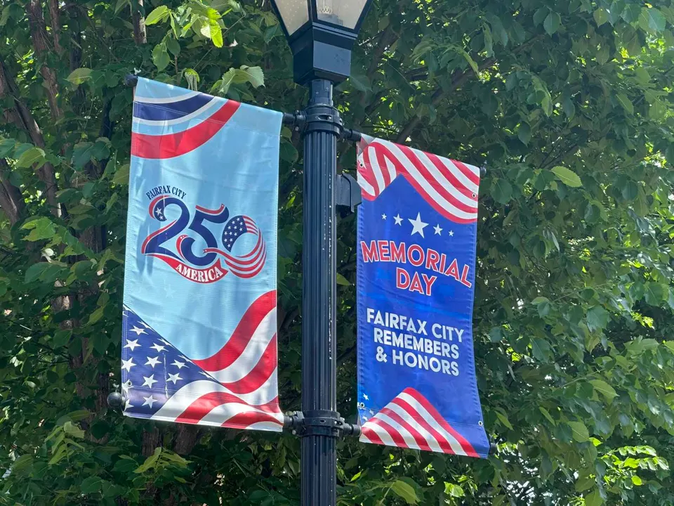 Memorial Day and America250 banners in Fairfax City (staff photo by Angela Woolsey)