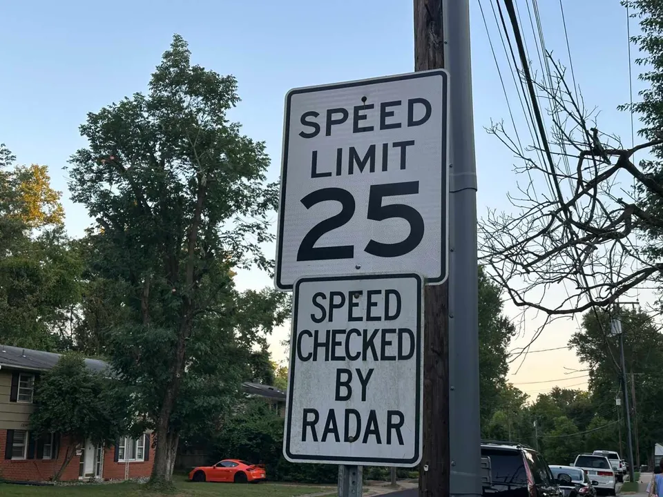 A 25 mph speed limit sign in a residential neighborhood (staff photo by Angela Woolsey)