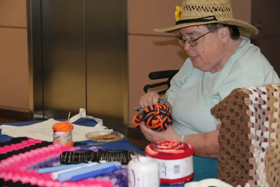 Marti Kelly showcases her technique at Pathway Homes exhibit (staff photo by Scott McCaffrey)