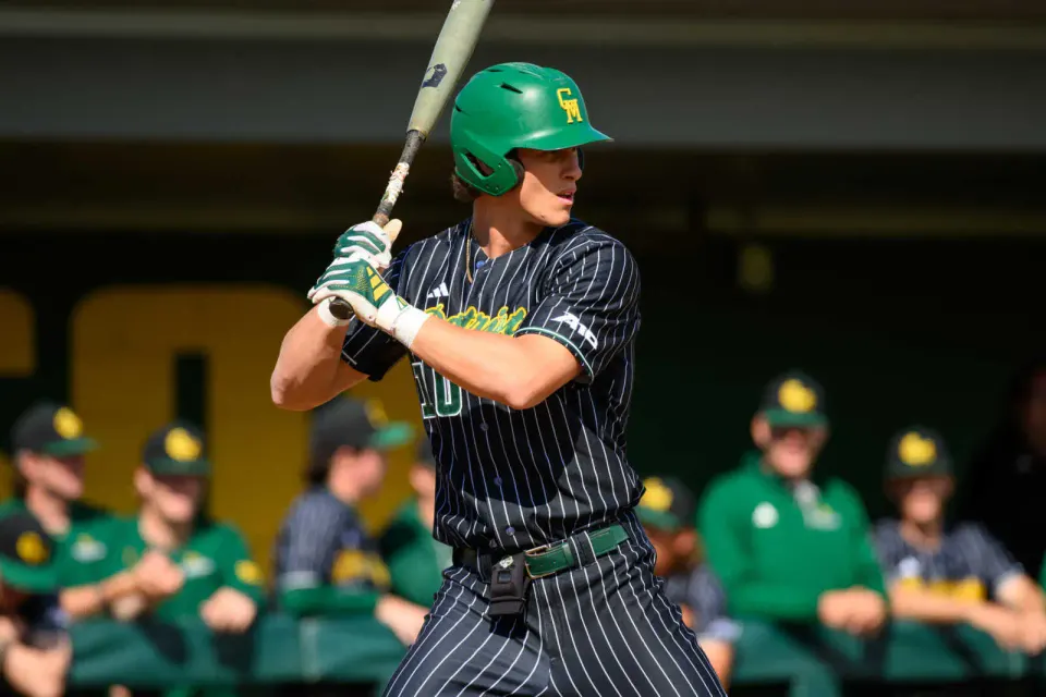 James Quinn-Irons bats for the George Mason Patriots against James Madison University (courtesy George Mason Athletics)