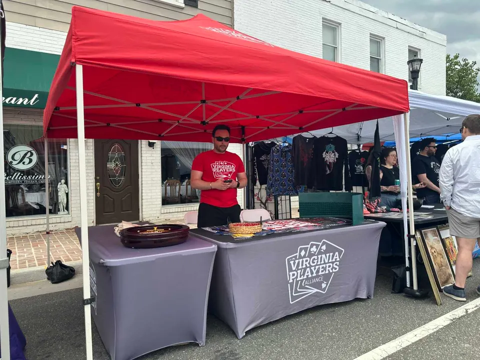 Virginia Players Alliance table at the 2025 Asia on Main Festival in Fairfax City (staff photo by Angela Woolsey)