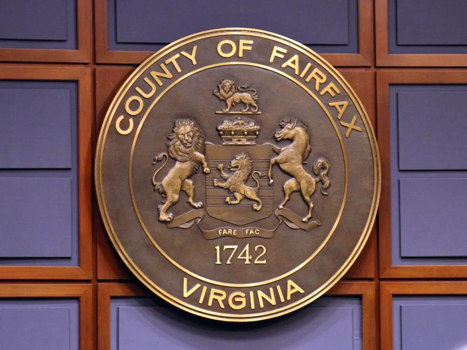 Seal of Fairfax County in the Board of Supervisors’ meeting room (staff photo by Jared Serre)