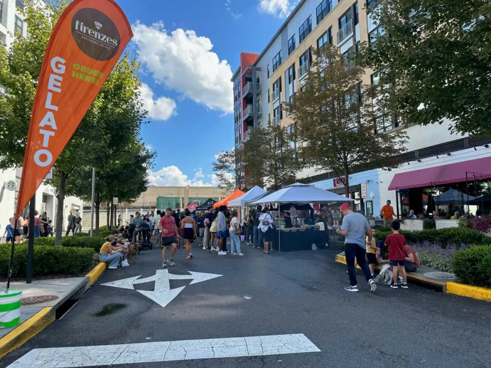 Stands serve food at the 2024 Mosaic District Fall Festival (staff photo by Angela Woolsey)