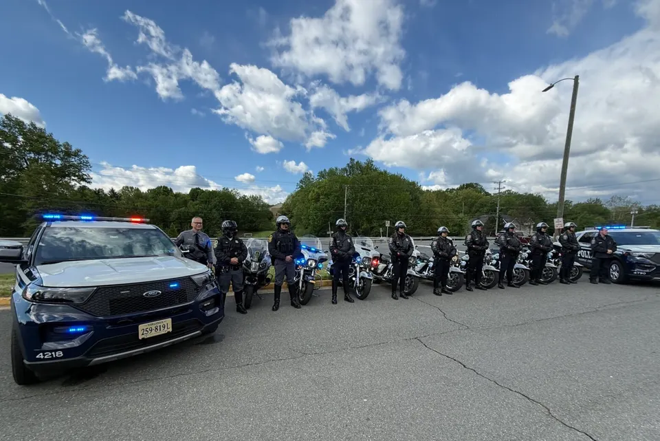 a row of fairfax county police motorcycles and