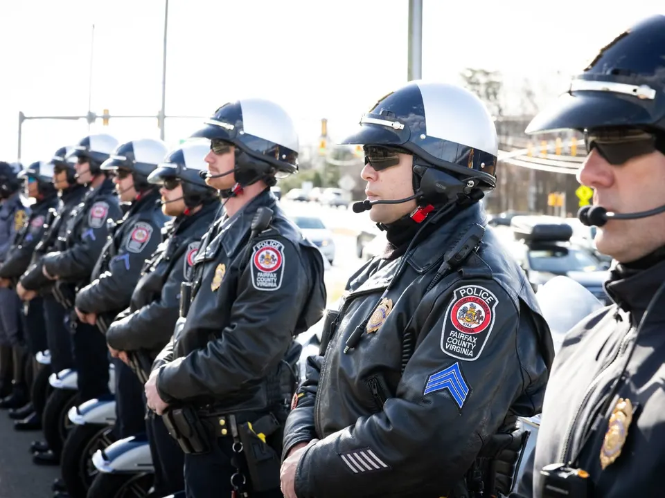 FCPD officers stand during a Road Shark press conference in 2025 (photo via FCPD/Flickr)