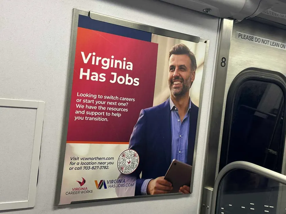 Virginia Career Works advertises job transition resources on a Metro train (staff photo by Angela Woolsey)