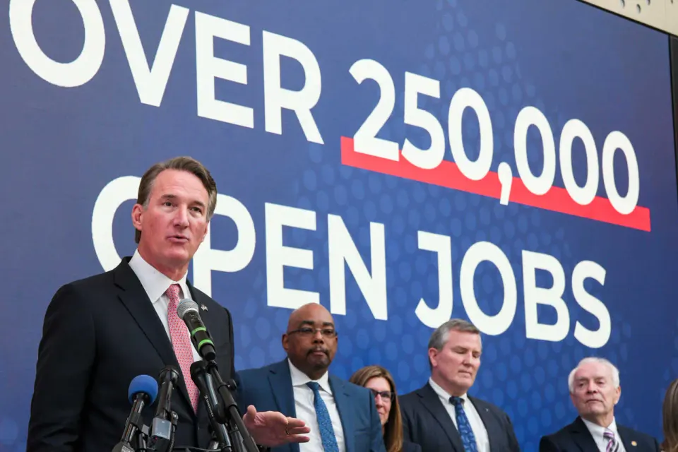 Gov. Glenn Youngkin speaking at the Capital One headquarters in Tysons on Feb. 24, 2025 (staff photo by James Jarvis)