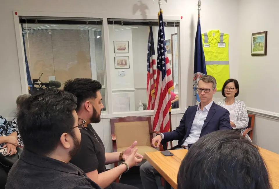 Rep. James Walkinshaw, of Virginia’s 11th Congressional District, speaks to local DACA recipients and immigration advocates during a round table discussion June 15 (staff photo...