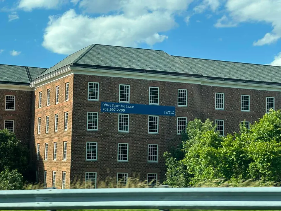 A sign advertises office space available for leasing in a building near Route 28 in Chantilly (staff photo by Angela Woolsey)