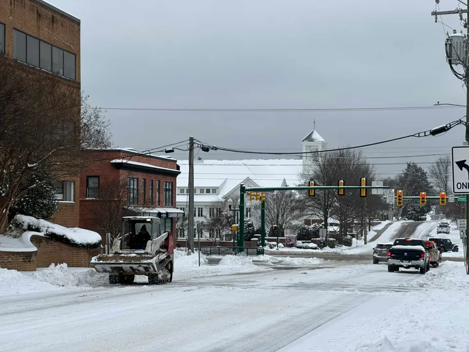 A snow plow near the Park Street and Maple Avenue intersection in Vienna on Jan. 6, 2025 (staff photo by Angela Woolsey)