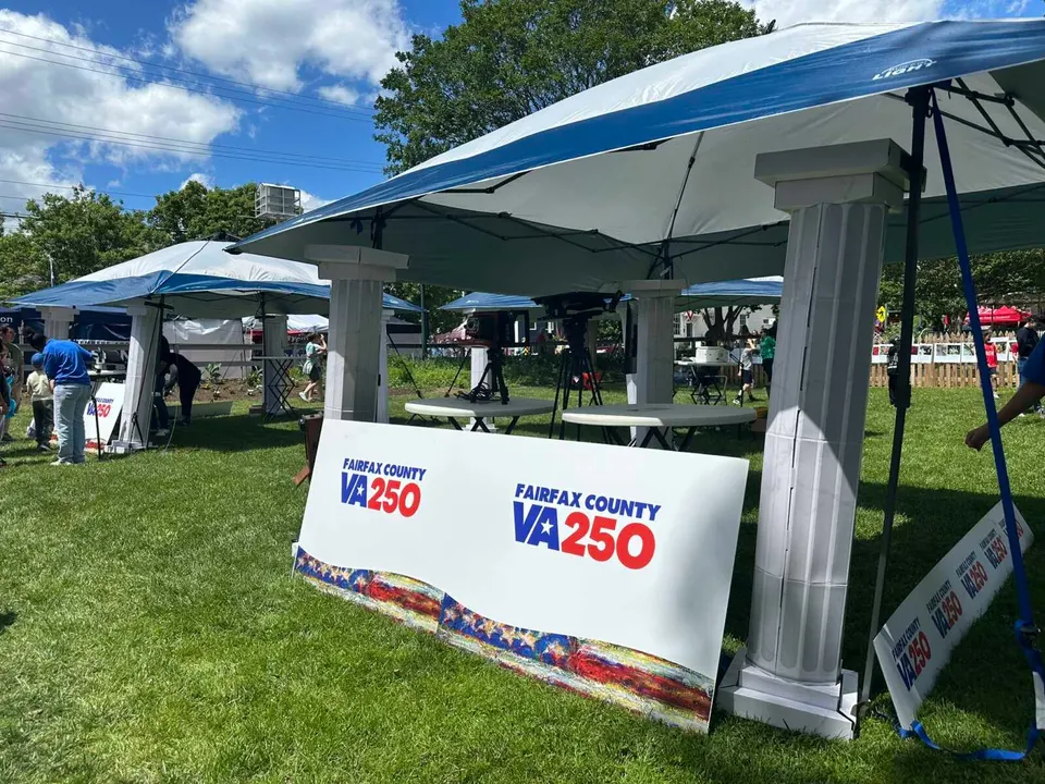 Sign for Fairfax County and Virginia’s commemoration of America’s 250th anniversary at ViVa Vienna (staff photo by Angela Woolsey)