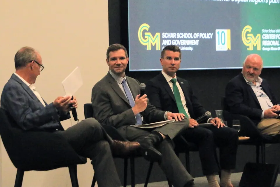Panelists Taylor Chess, Jason Stanford, Ryan McLaughlin and Terry Clower at a George Mason University regional economic forum (staff photo by Scott McCaffrey)