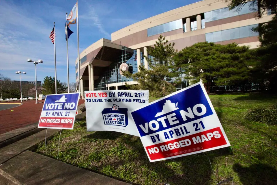 Campaigns both for and against Virginia’s redistricting referendum at the Fairfax County Government Center (staff photo by James Cullum)