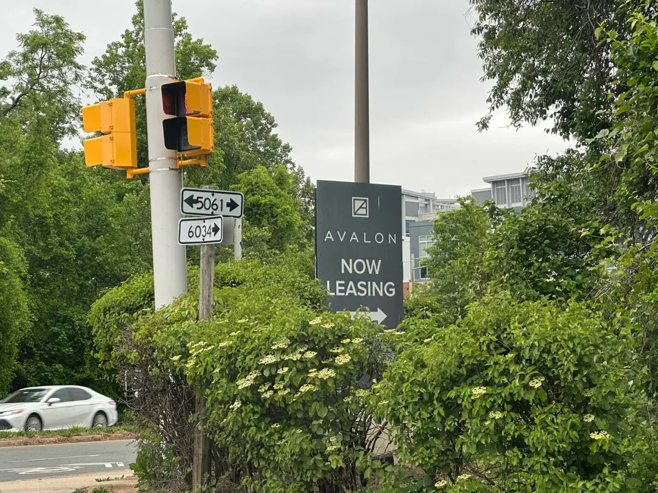 A now leasing sign for Avalon Apartments in Tysons (staff photo by Angela Woolsey)