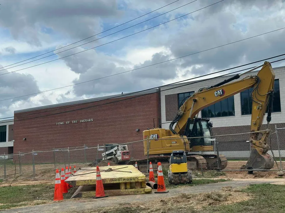 Construction equipment outside Falls Church High School during ongoing renovation (staff photo by Angela Woolsey)