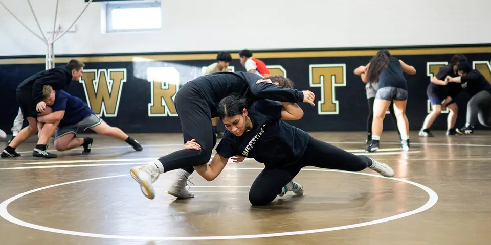 Westfield High School’s girls wrestling team in action (photo by Karen Bolt/FCPS)