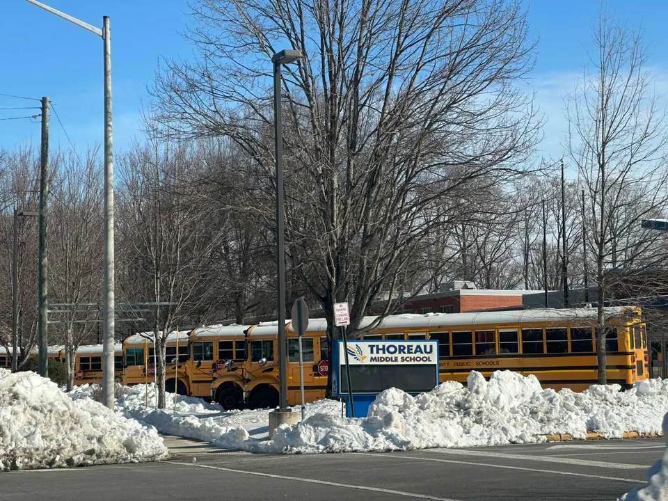 A path has been cleared through snow and ice outside Thoreau Middle School in Vienna (staff photo by Angela Woolsey)