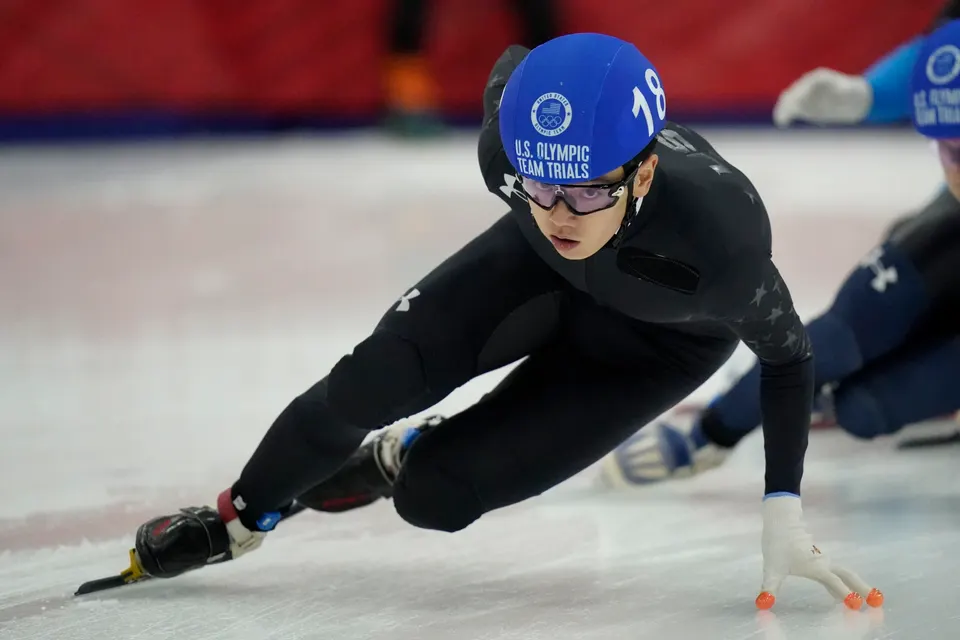 Brandon Kim (18) competes in the men’s 1500-meter semifinal during the U.S. Olympic short track speedskating trials Saturday, Dec. 18, 2021, in Kearns, Utah. (AP Photo/Rick Bowmer)