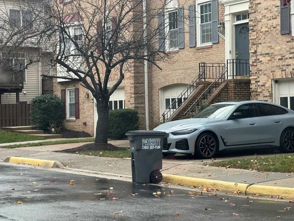 Trash collection bin outside a townhouse in Tysons (staff photo by Angela Woolsey)