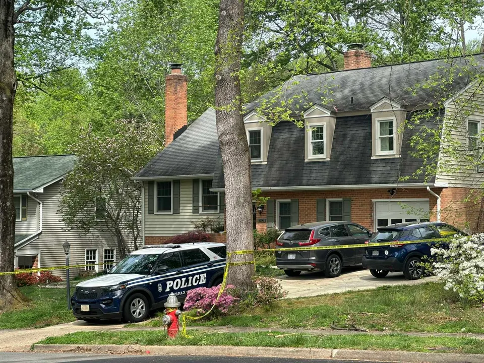 A Fairfax County Police Department vehicle parked in the driveway of Cerina and Justin Fairfax’s house in Annandale (staff photo by Angela Woolsey)