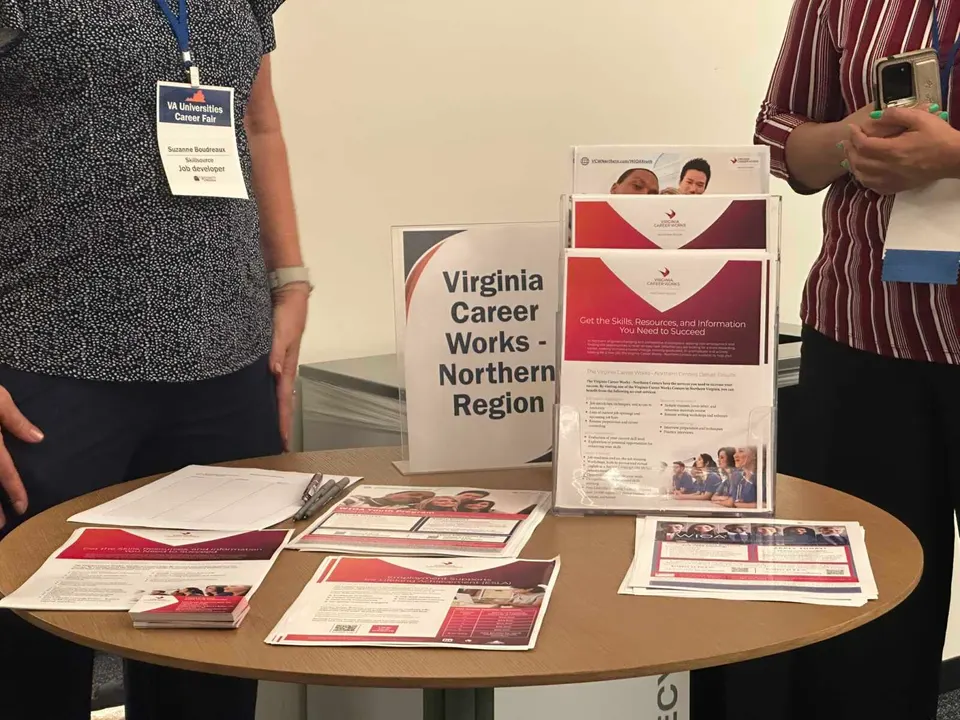 Virginia Career Works Northern Region table at a University of Virginia job fair in August 2025 (staff photo by Angela Woolsey)