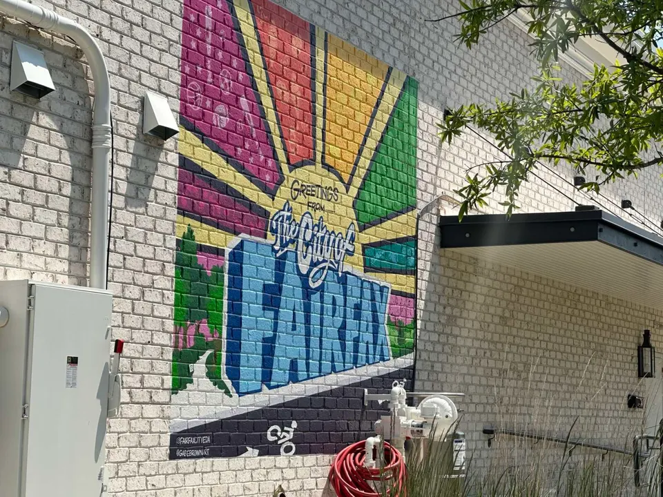 Greetings from the City of Fairfax mural (staff photo by Angela Woolsey)