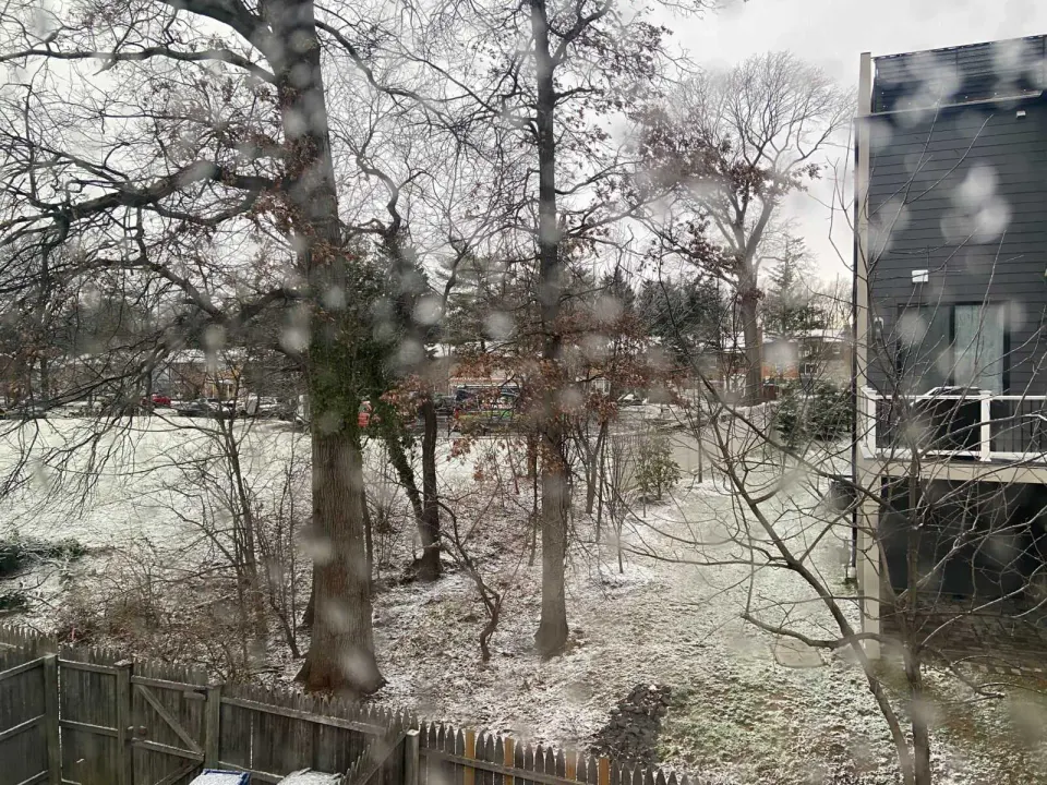 Snow is falling in Merrifield (staff photo by Jared Serre)