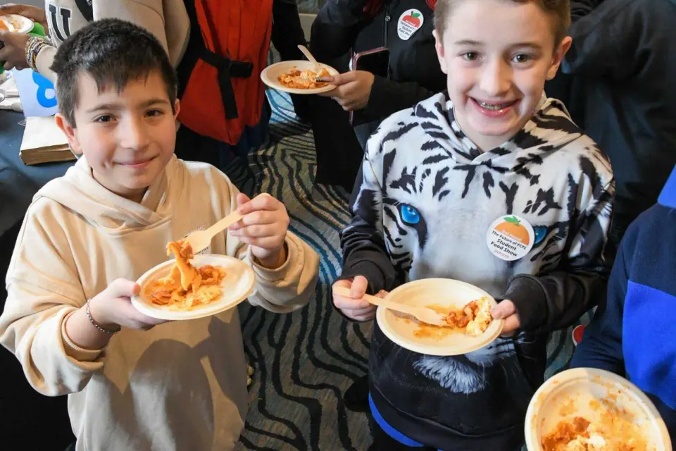 Students sample a new pasta concept at the second annual FCPS student food show (staff photo by James Jarvis)