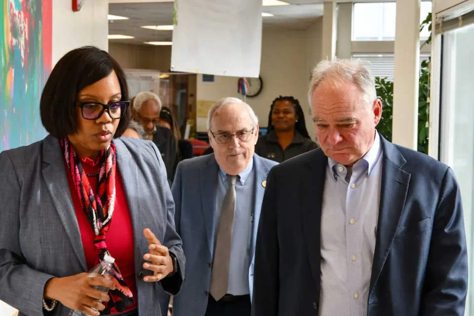 Sen. Tim Kaine walks with High Horizons Executive Director Latisha Howze (staff photo by James Jarvis)