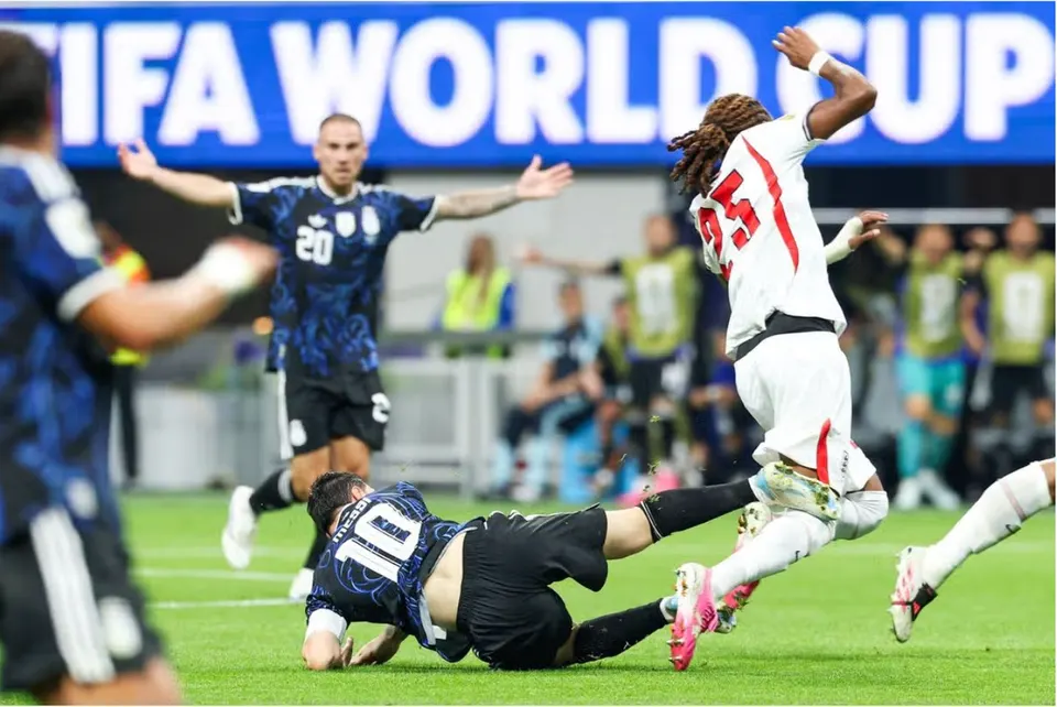 According to The Mirror: "England fans took issue with [Lionel] Messi's tackle on [Djed] Spence. Photo by Vanessa Carvalho Brazil. Courtesy The Mirror.