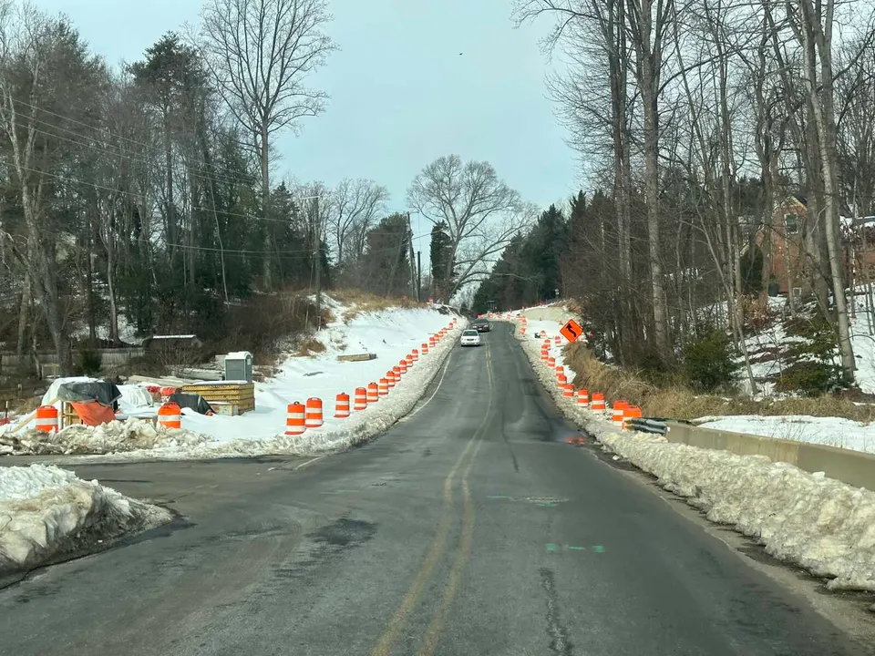 Construction barrels line Old Courthouse Road in Wolf Trap (staff photo by Angela Woolsey)