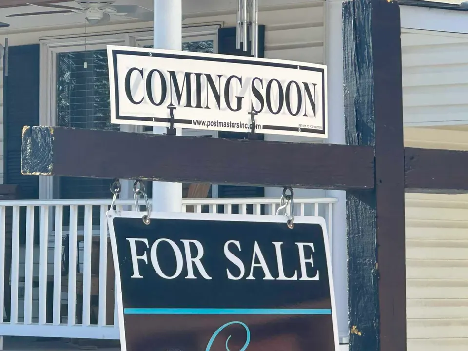 A for sale sign for a house in Vienna coming soon to the market (staff photo by Angela Woolsey)