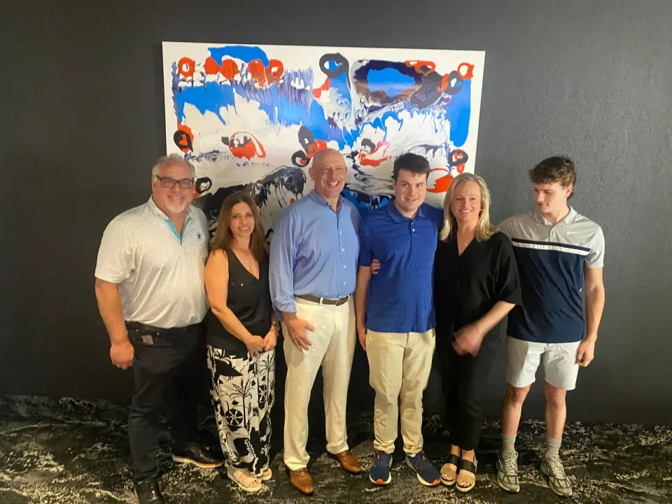 Celebrating the unveiling of Michael LIndsay's "Story in Blue" at Paragon Theaters Founders Row. Left to right: CEO, Brian Hood, Art Mentor, Randa LoGerfo, Co-Owner, Michael...