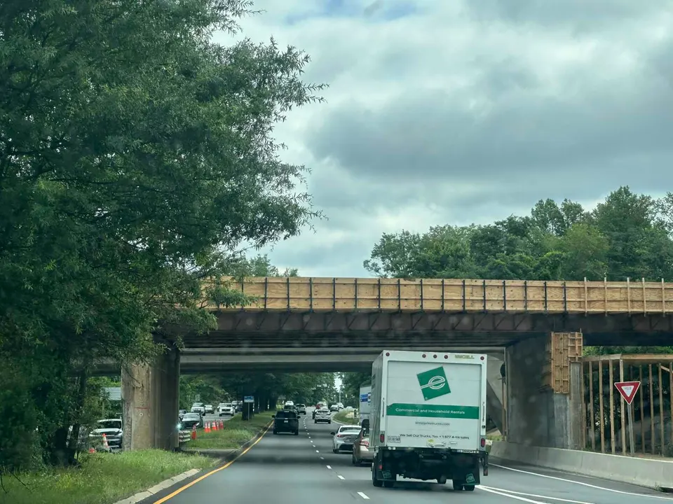 Traffic exiting Tysons into McLean on Route 123 under the eastbound Dulles Toll Road bridge, which is under rehabilitation (staff photo by Angela Woolsey)