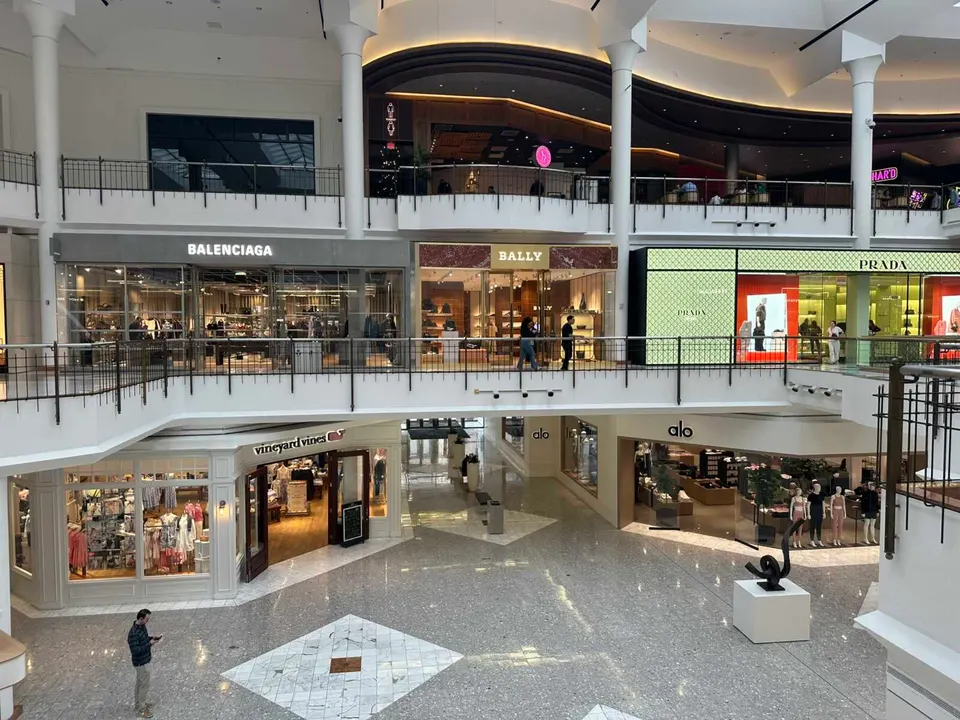 Fashion stores Balenciaga, Bally and Prada on the second floor of Tysons Galleria (staff photo by Angela Woolsey)