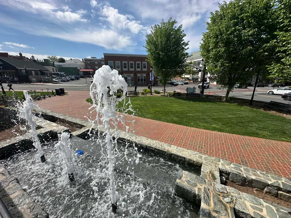 Behind the fountain in Fairfax City’s Old Town Square (staff photo by Angela Woolsey)