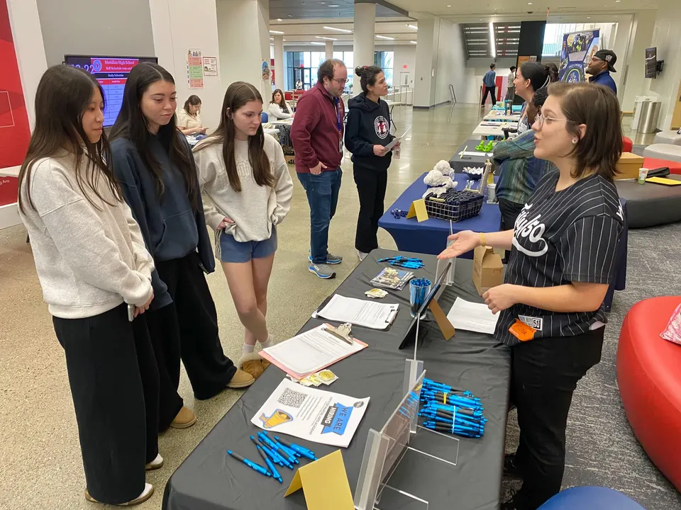 Three Meridian students on lunch break meet Valerie Peacock of Fifty/50 Martial Arts Academy which has two flexible front office positions available for high school students....