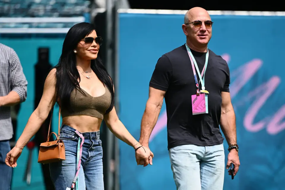 At day at the races. Jeff Bezos and Lauren Sanchez at Miami International Autodrome, May, 2024. Clive Mason/Formula 1 via Getty Images.