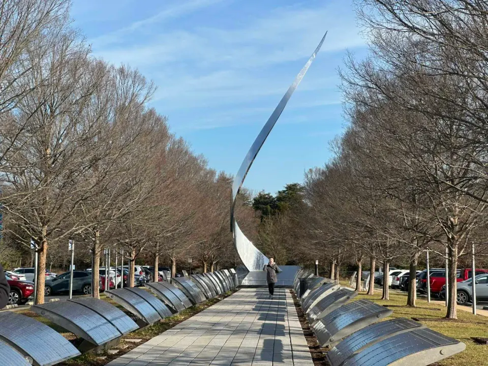 Bare trees line the path to the “Ascent” sculpture at the Smithsonian Air and Space Museum’s Udvar-Hazy Center in Chantilly (staff photo by Angela Woolsey)